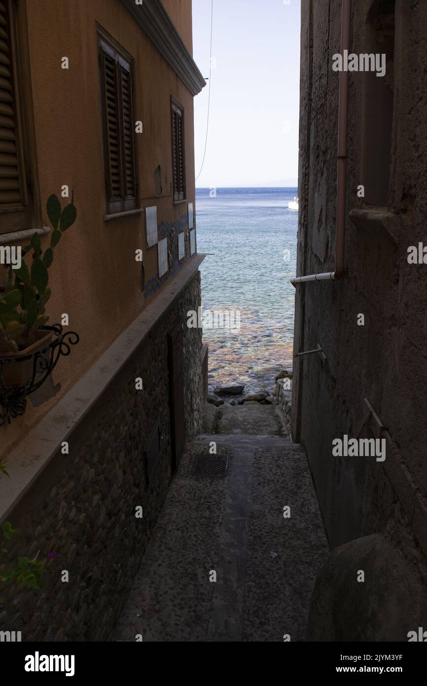 The characteristic village of Chianalea in Scilla with its houses and alleys overlooking the sea Stock Photo