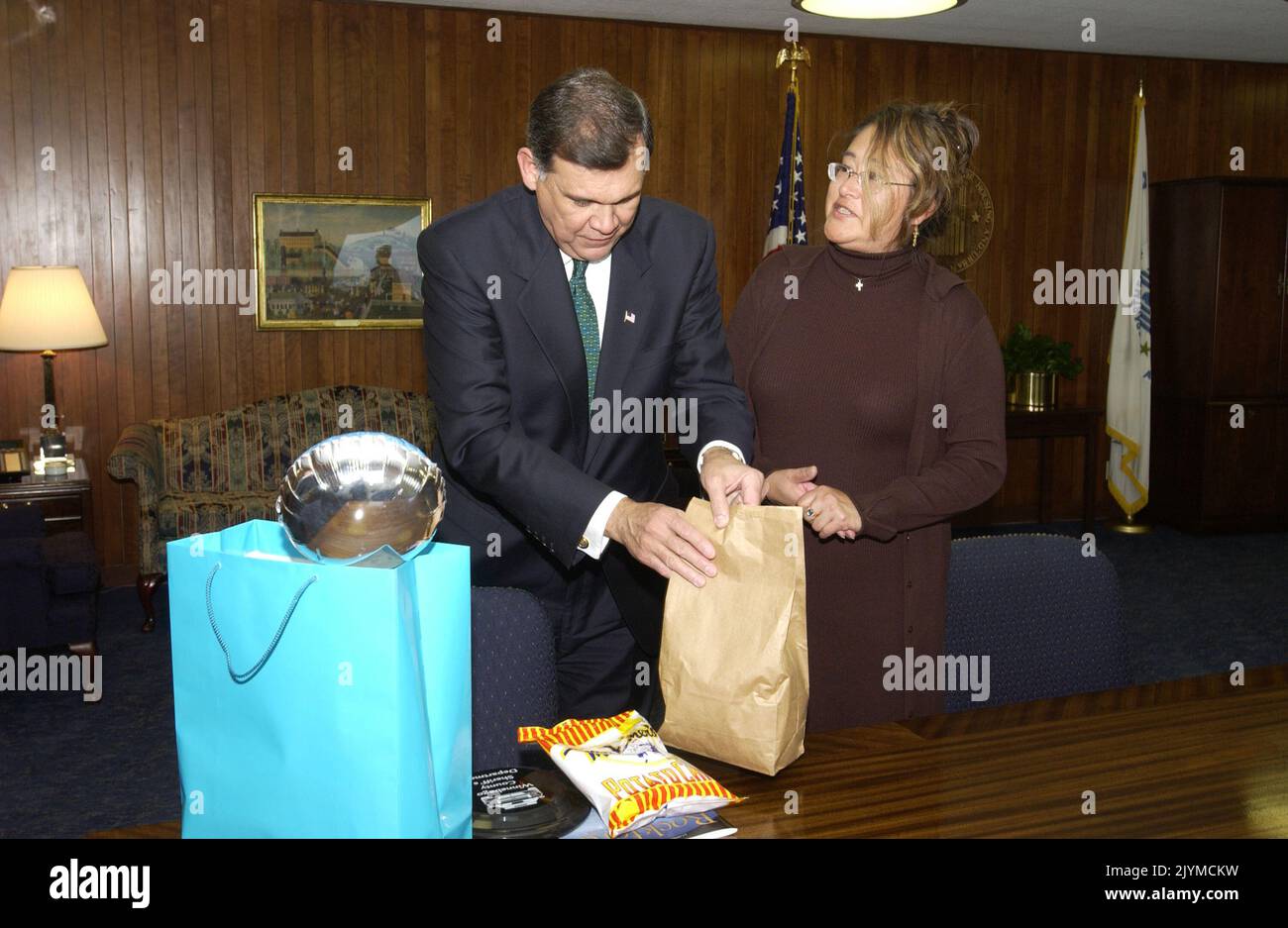 Secretary Mel Martinez with Sarah Moyado. Secretary Mel Martinez with