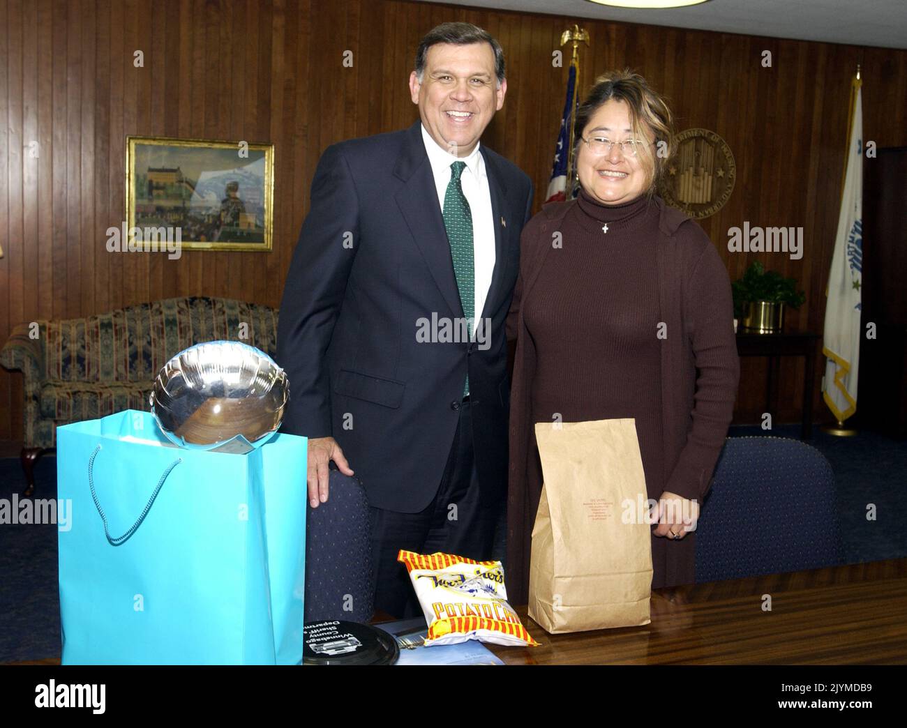 Secretary Mel Martinez with Sarah Moyado. Secretary Mel Martinez with