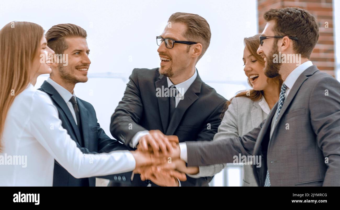 business team showing their unity Stock Photo - Alamy