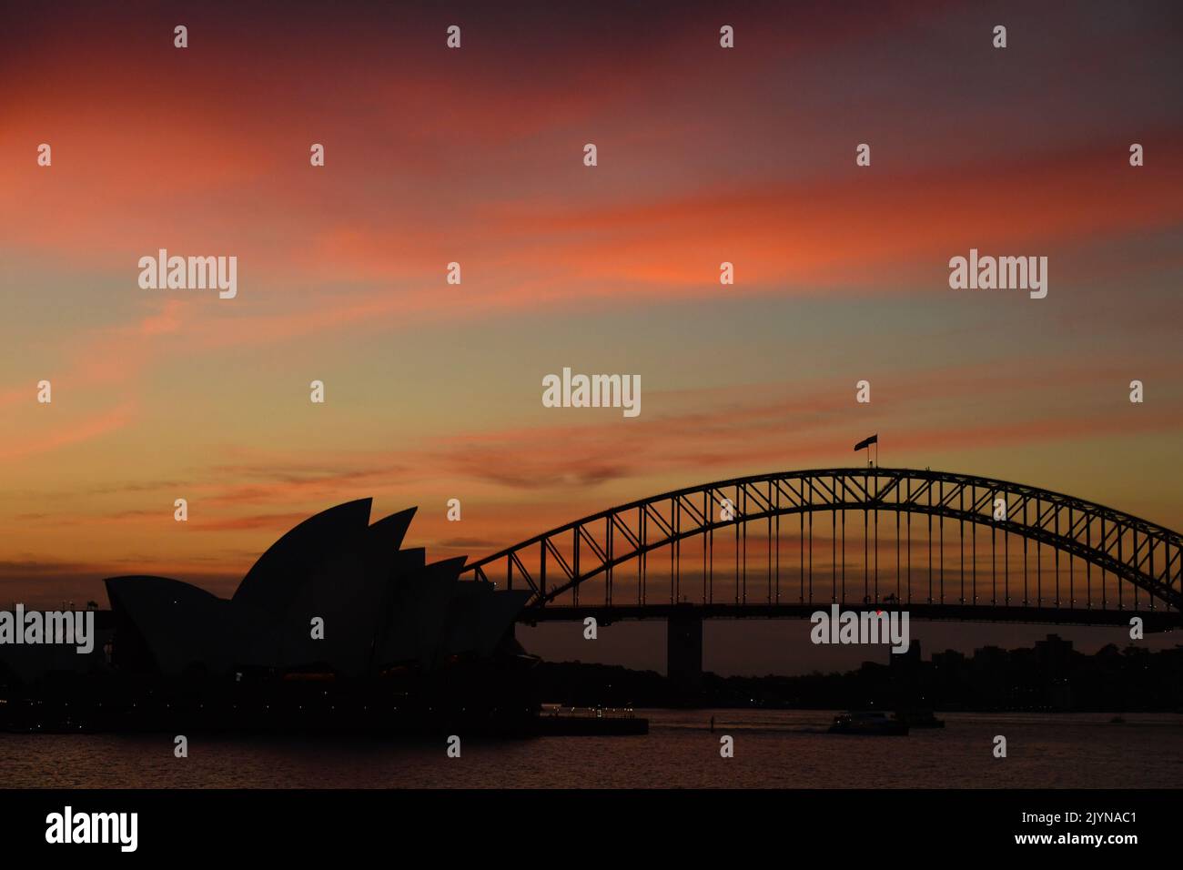 The Sydney Opera House and Sydney Harbour Bridge are seen during a ...