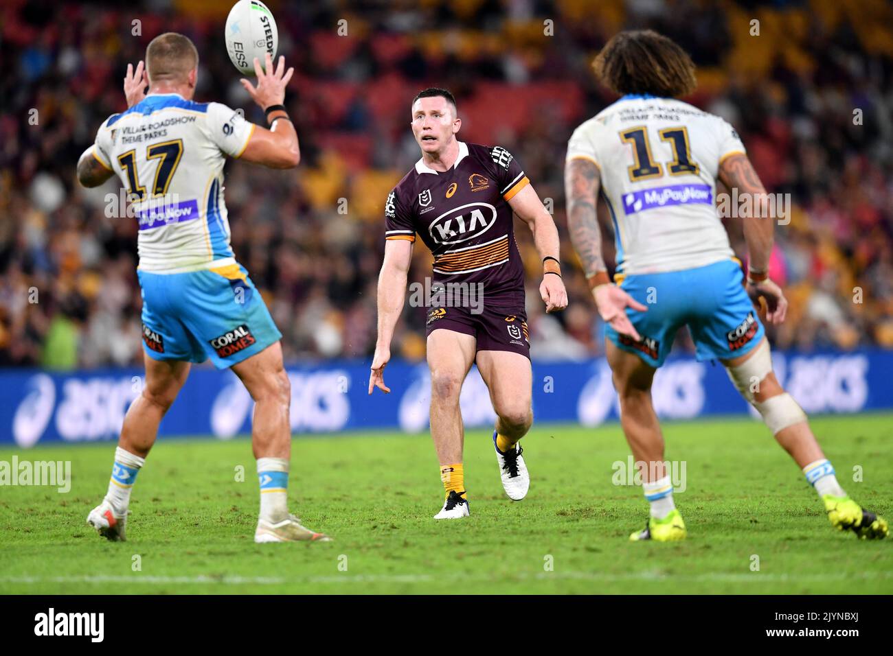 Tyson Gamble (centre) of the Broncos in action during the Round 8 NRL match between the Gold Coast Titans and the Brisbane Broncos at Suncorp Stadium in Brisbane, Friday, April 30, 2021. (AAP Image/Darren England) NO ARCHIVING, EDITORIAL USE ONLY ** STRICTLY EDITORIAL USE ONLY, NO COMMERCIAL USE, NO BOOKS ** Stock Photo