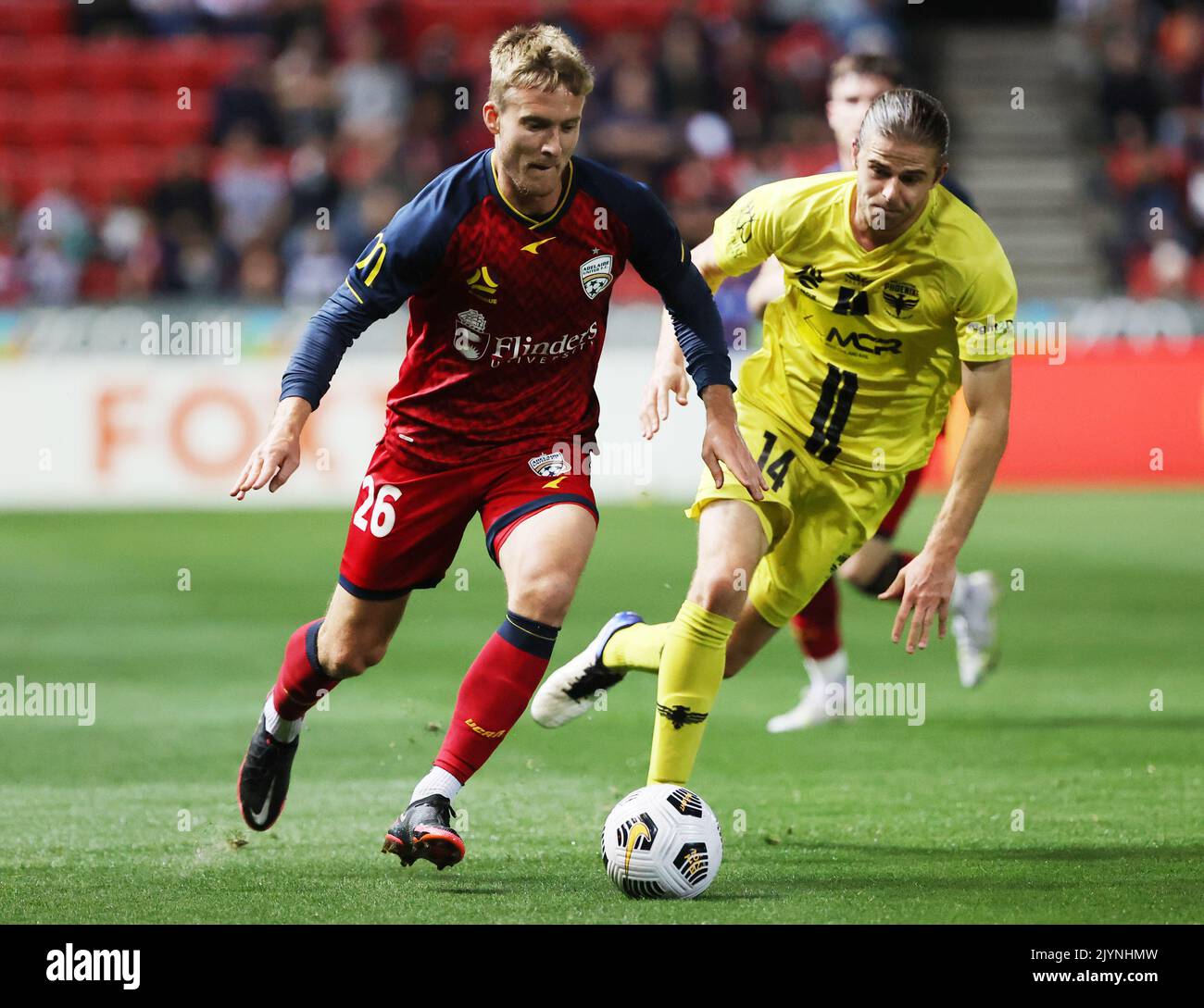 Benjamin Halloran of United and Alex Rufer of the Phoenix during the A ...