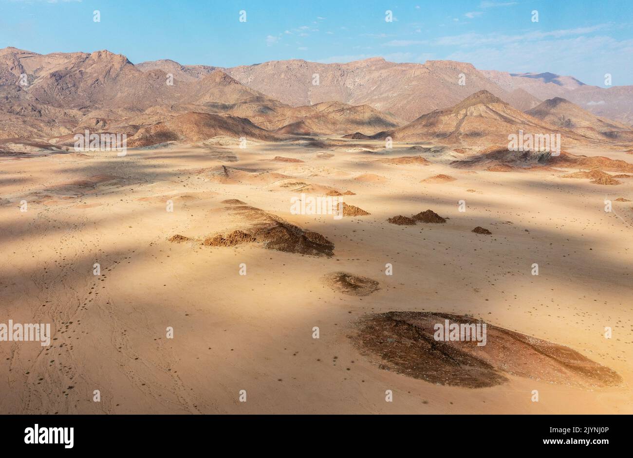 Arid plains and the Brandberg, Namibia's highest mountain. Aerial view