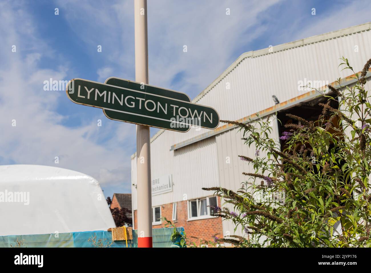 Lymington Town railway station signpost, Hampshire, England Stock Photo