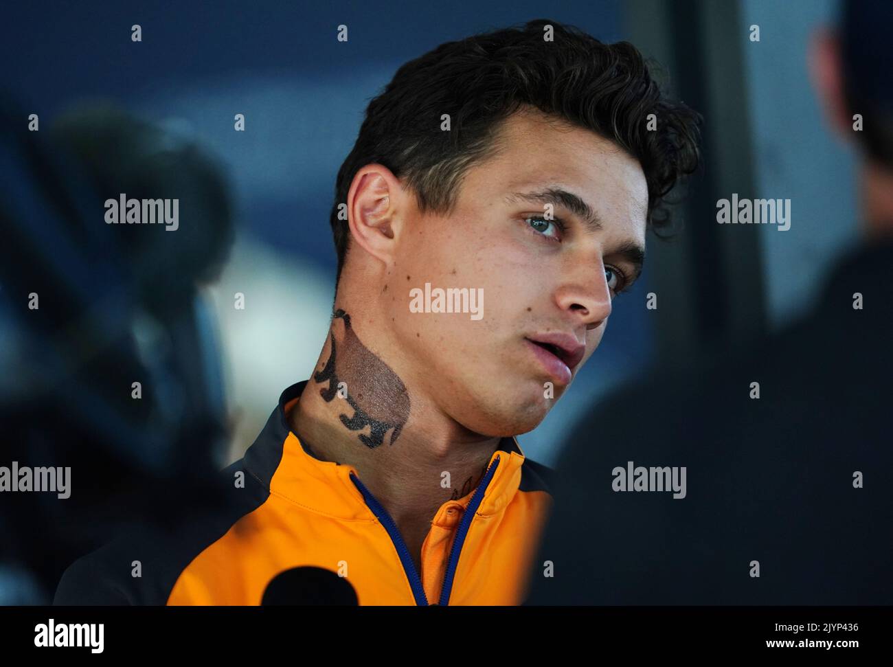 McLaren's Lando Norris  with a Badger tattoo on his neck during the preparation day at the Italian Grand Prix, Monza. Picture date: Thursday September 8, 2022. Stock Photo