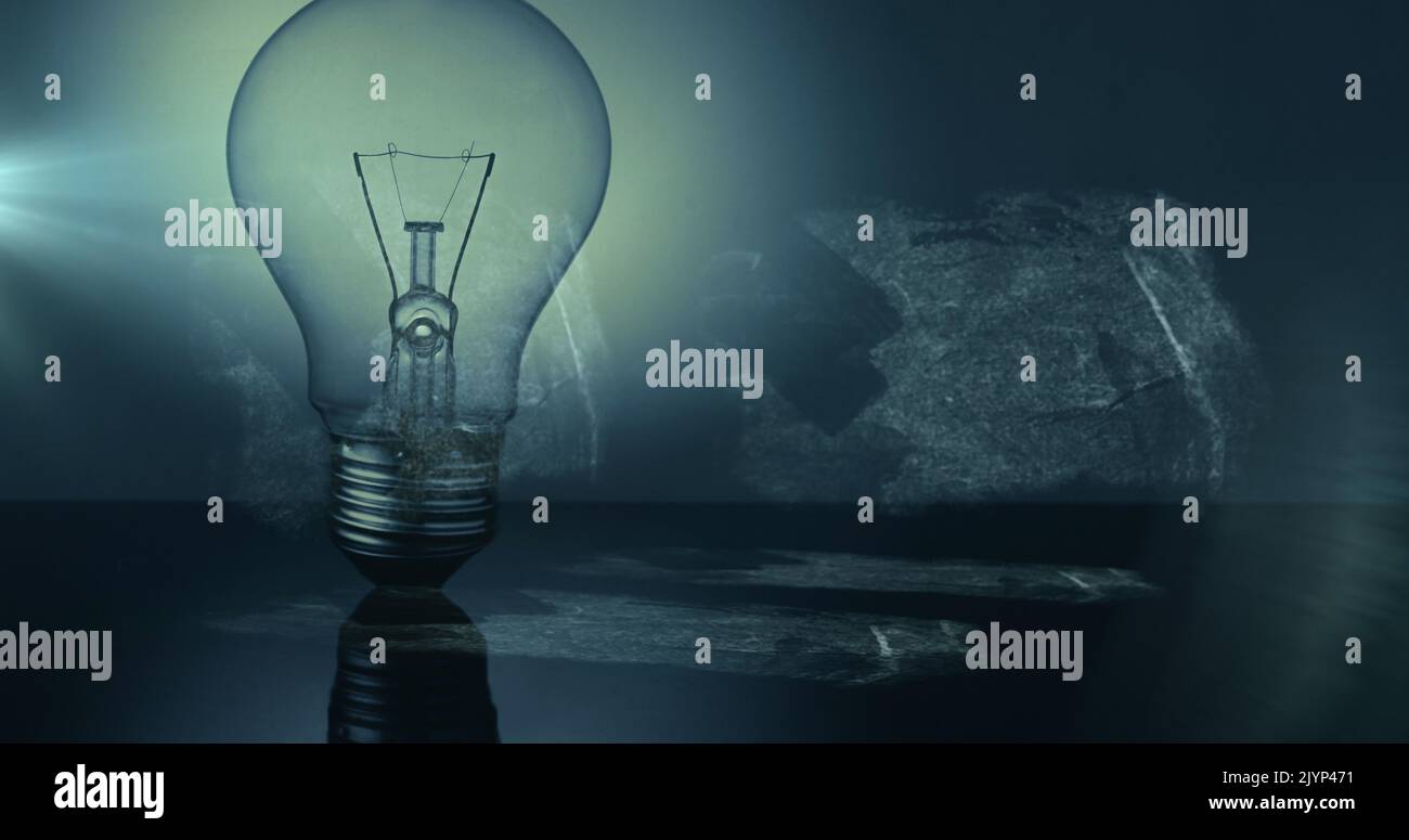 Image of light bulb with scientific formulae and data processing Stock
