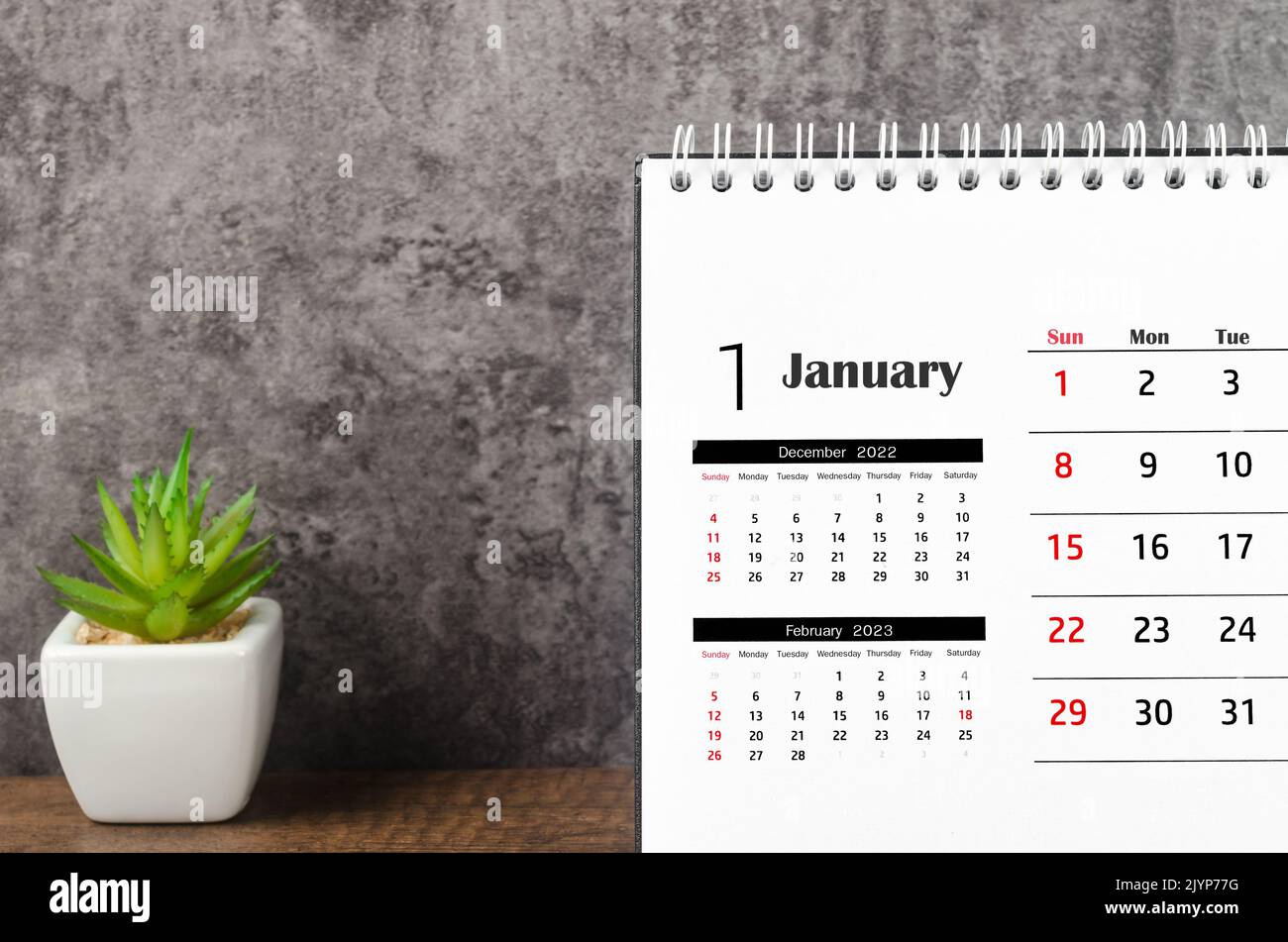 January 2023 Monthly desk calendar for 2023 on wooden background Stock ...