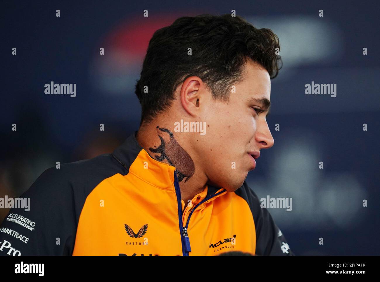 McLaren's Lando Norris with a Badger tattoo on his neck during the preparation day at the Italian Grand Prix, Monza. Picture date: Thursday September 8, 2022. Stock Photo