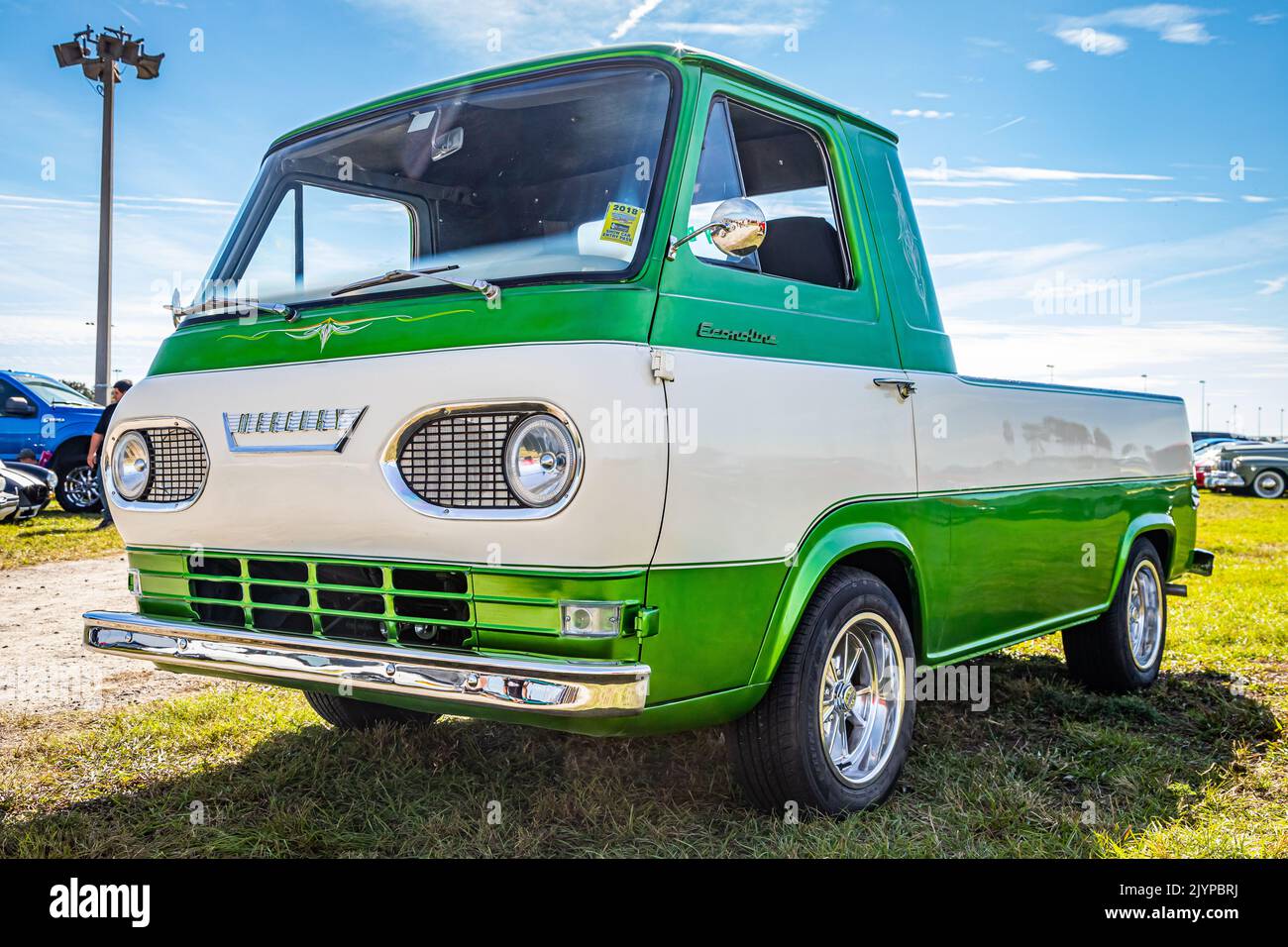 Daytona Beach, FL - November 24, 2018: Low perspective front corner view of a 1964 Mercury Econoline Pickup Truck at a local car show. Stock Photo