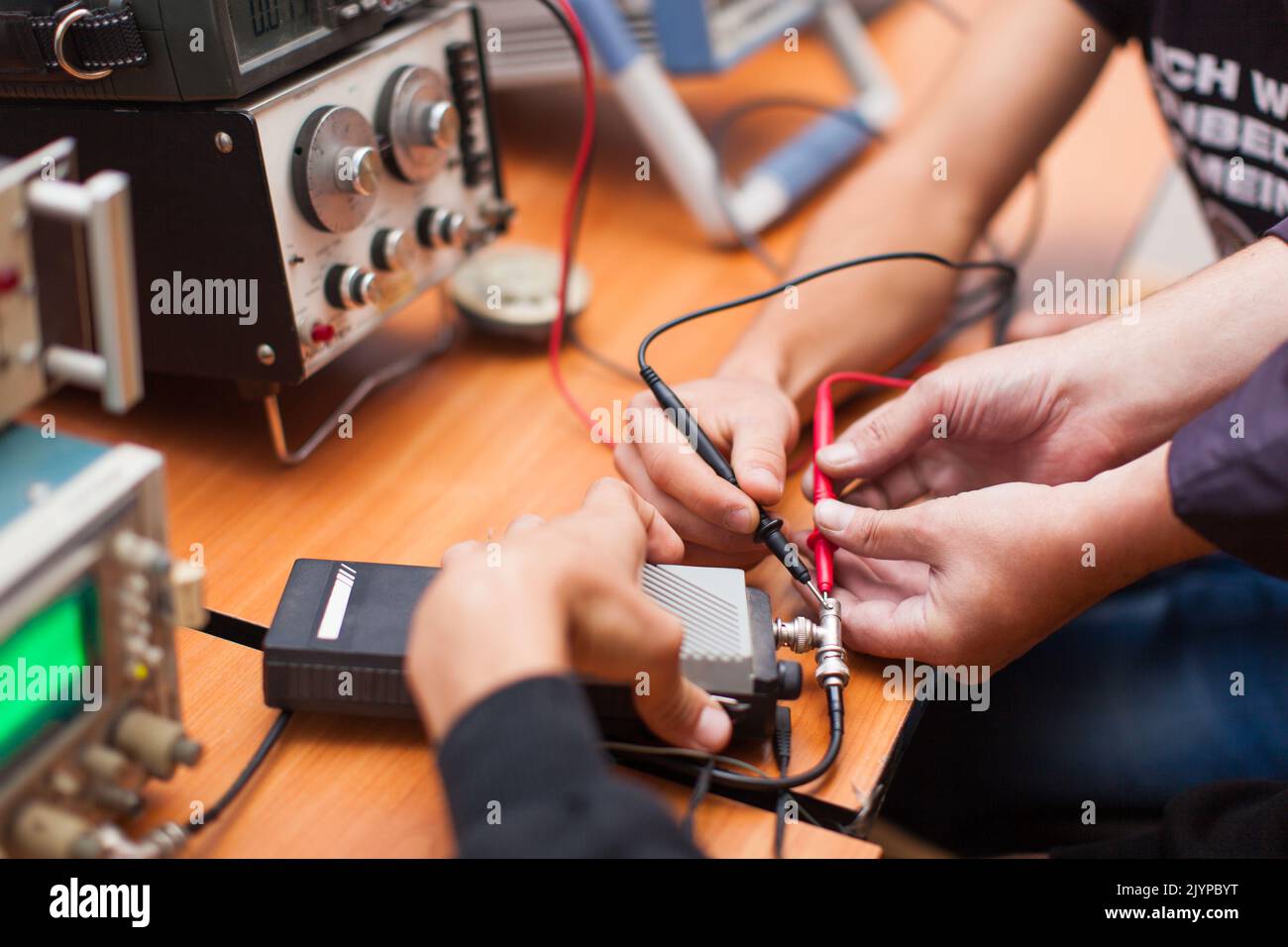 engineers work with electrical measuring devices Stock Photo Alamy