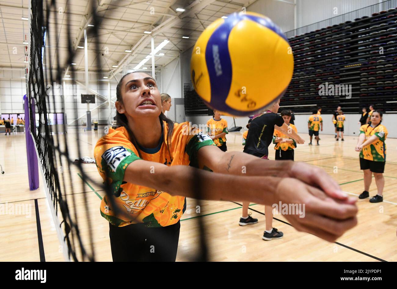 Australian beach volleyballer Taliqua Clancy is seen with students