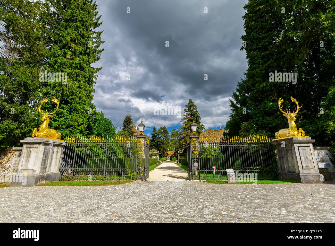 The baroque entrance to the Wenkenpark in Riehen guarded by two gilded deer modeled after the French sculptor Jean Goujon (XVI century), Basel-Stadt c Stock Photo