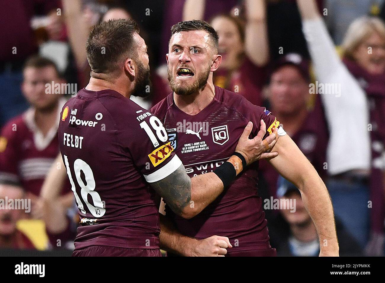 Kurt Capewell of the Maroons celebrates after scoring a try during Game