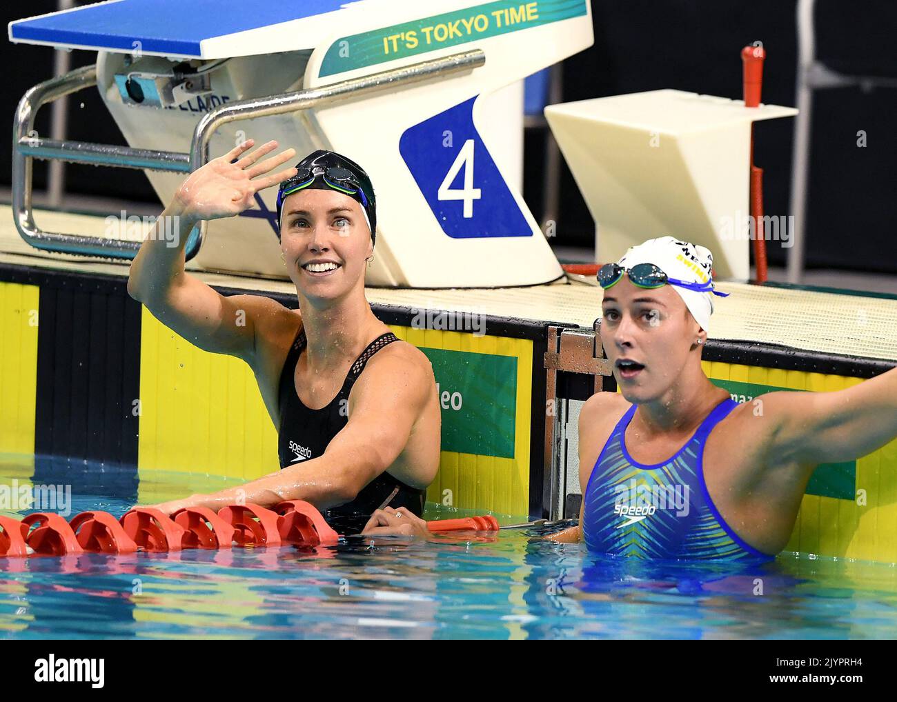 Emma McKeon (left) celebrates after setting an Australian record in the Women’s 100m Butterfly final on Day 1 of the Australian Swimming Trials for Tokyo Olympic and Paralympic qualification, at the SA Aquatic and Leisure Centre in Adelaide, Saturday, June 12, 2021. (AAP Image/Dave Hunt) NO ARCHIVING, EDITORIAL USE ONLY ** STRICTLY EDITORIAL USE ONLY, NO COMMERCIAL USE, NO BOOKS ** Stock Photo