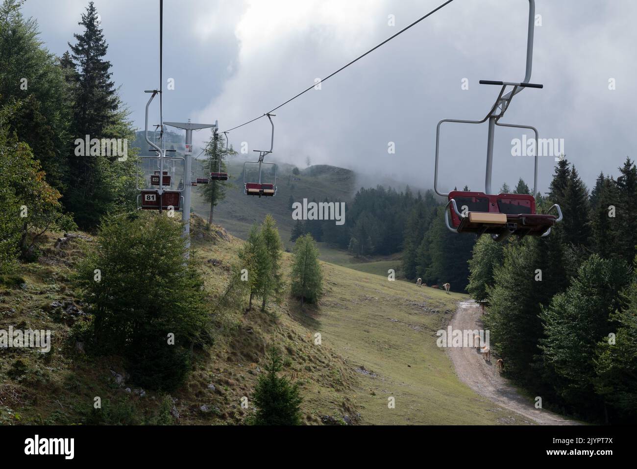 Empty chairlift in ski resort, during the summer, Velika Planina, Slovenia Stock Photo