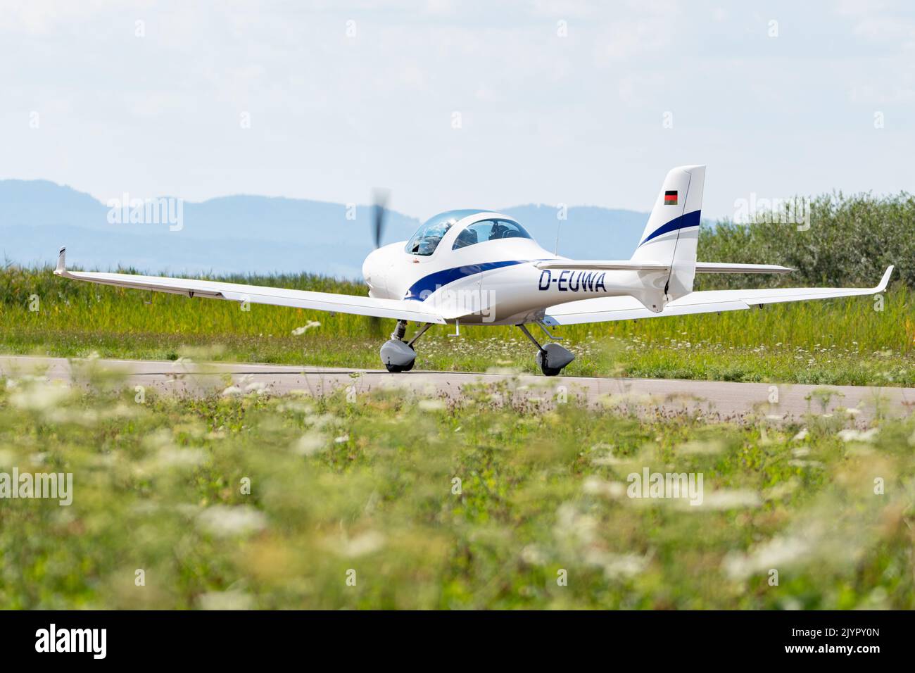Wangen-Lachen, Switzerland, July 31, 2022 Aquila 210 propeller plane has just landed on a small airfield Stock Photo