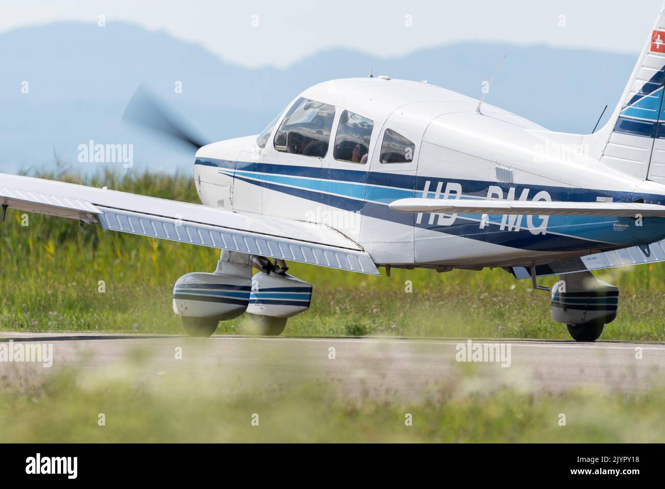 Wangen-Lachen, Switzerland, July 31, 2022 Piper PA28-181 Archer II is landing on a small airfield Stock Photo