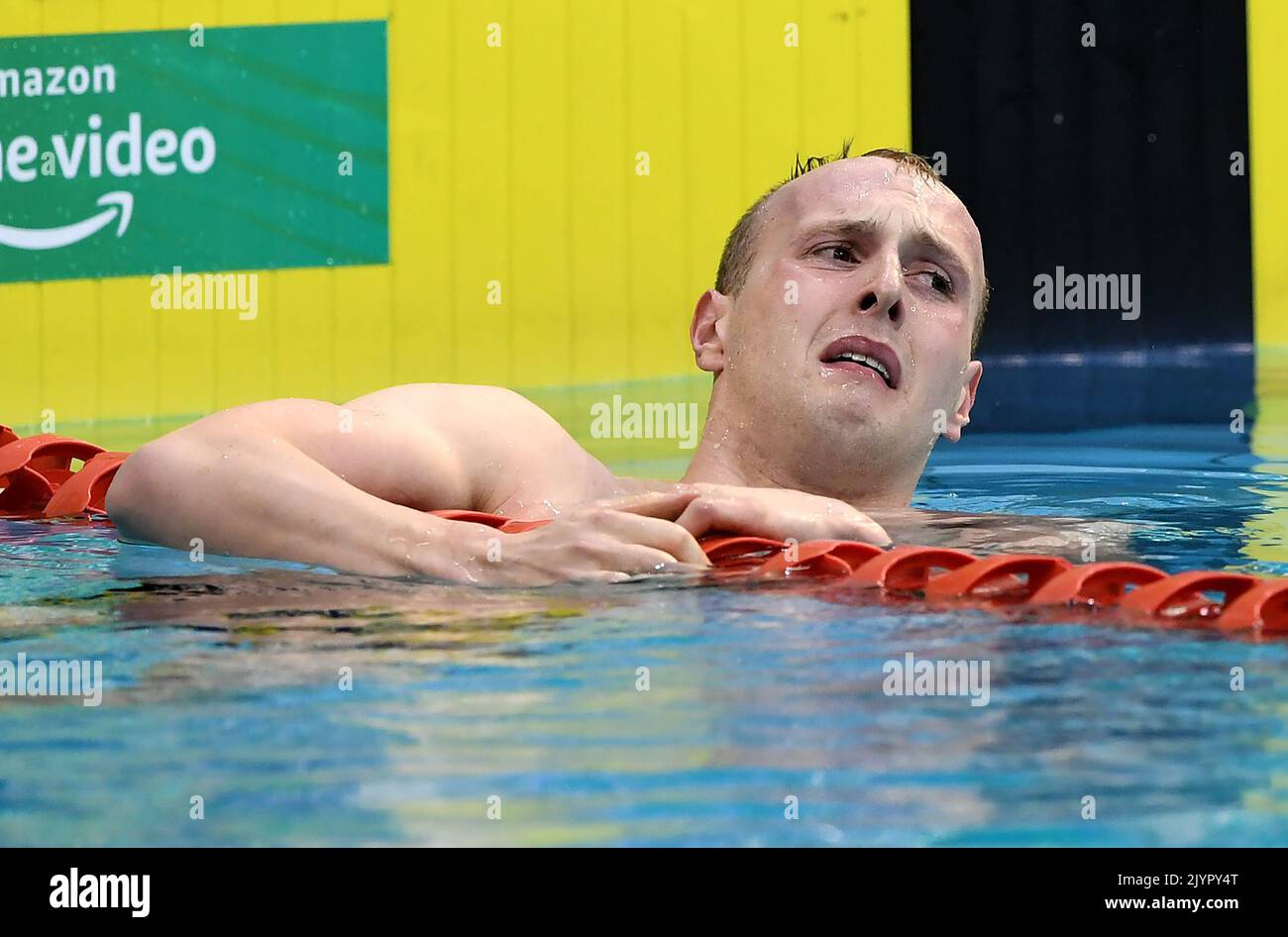Matthew Wilson reacts after failing to qualify after the Men’s 200m ...