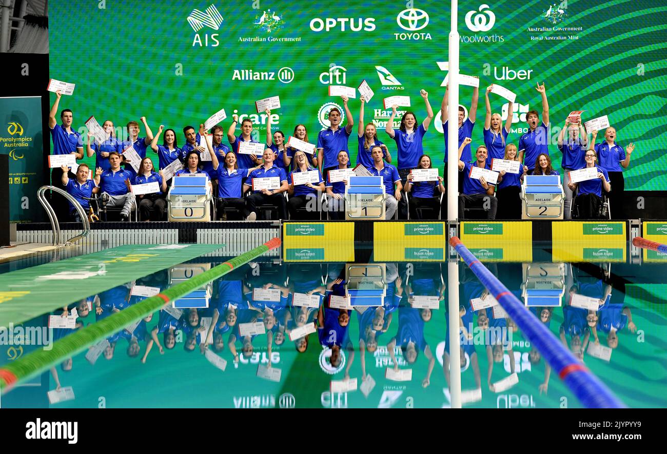 The Australian Paralympic team pose for a photograph after receiving