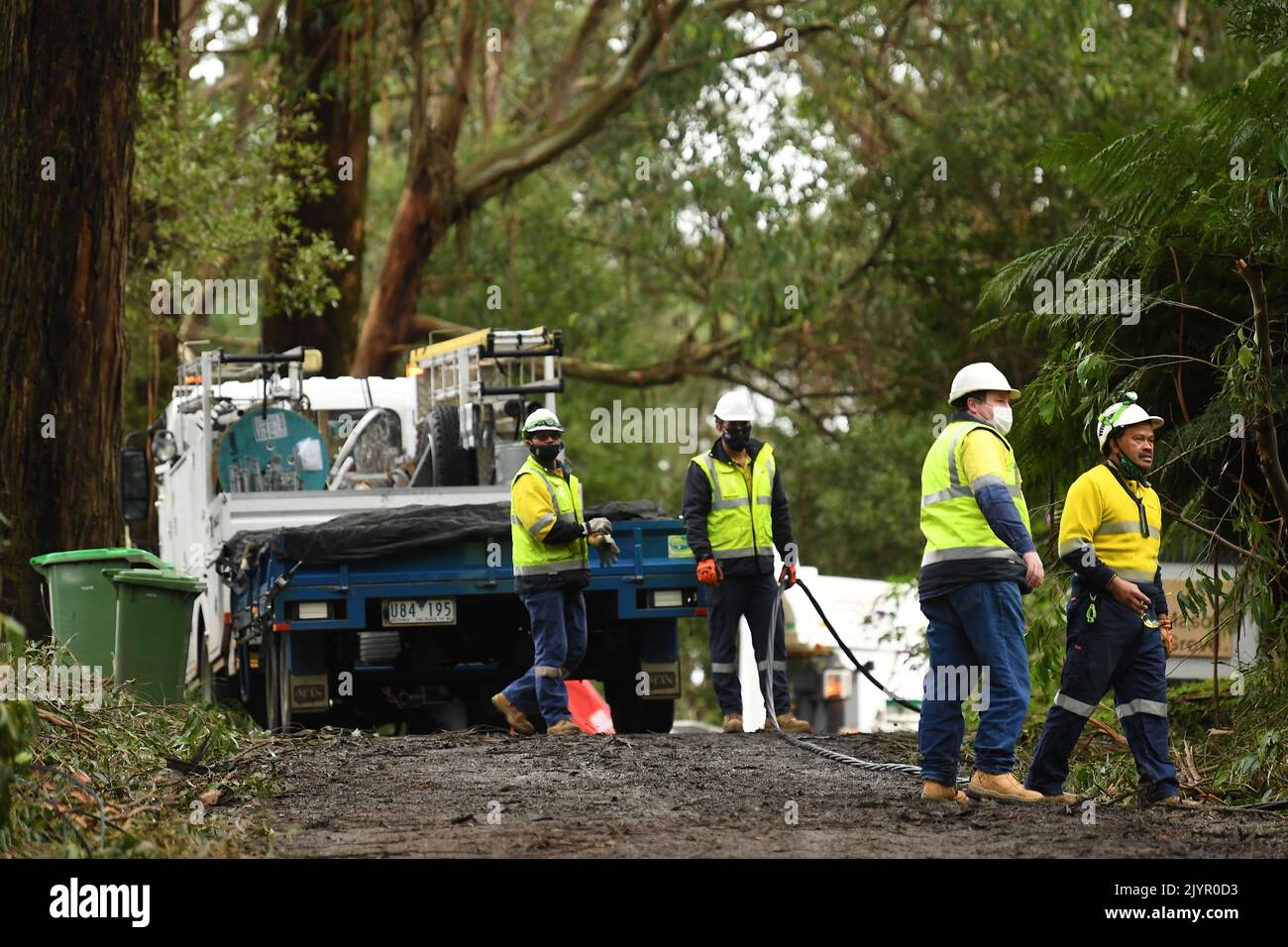 Constructions crews work to restore power lines in Olinda, Victoria