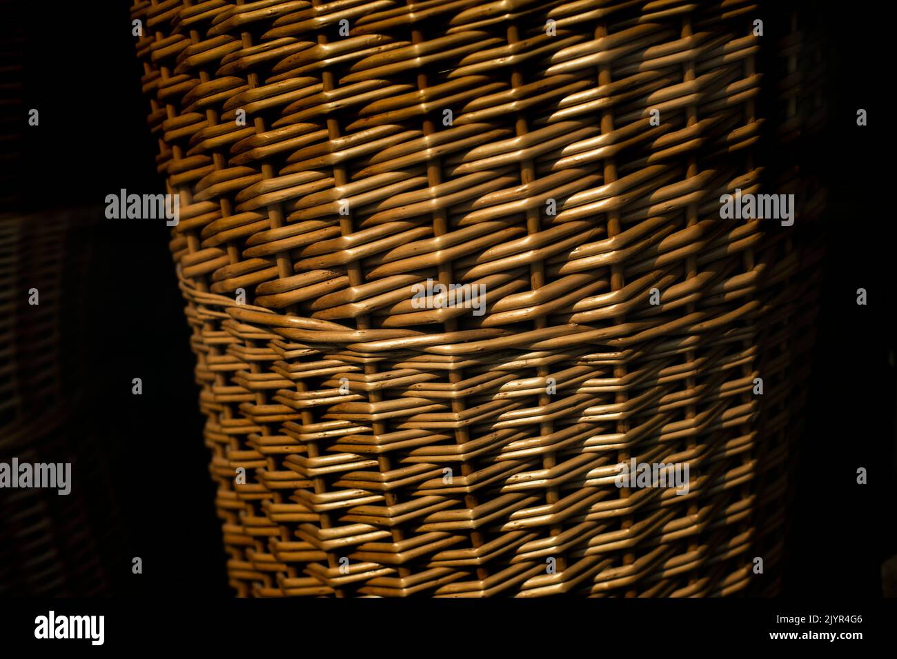 Basket wicker. Wood texture. Dry stem container. Folk craft Stock Photo