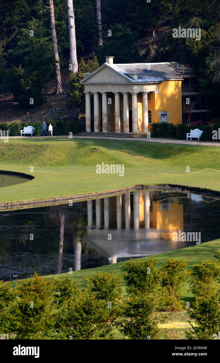 Temple of Piety Reflected in the Waters of the Moon & Crescent Ponds at Fountains Abbey and Studley Royal Water Garden, North Yorkshire, England, UK. Stock Photo