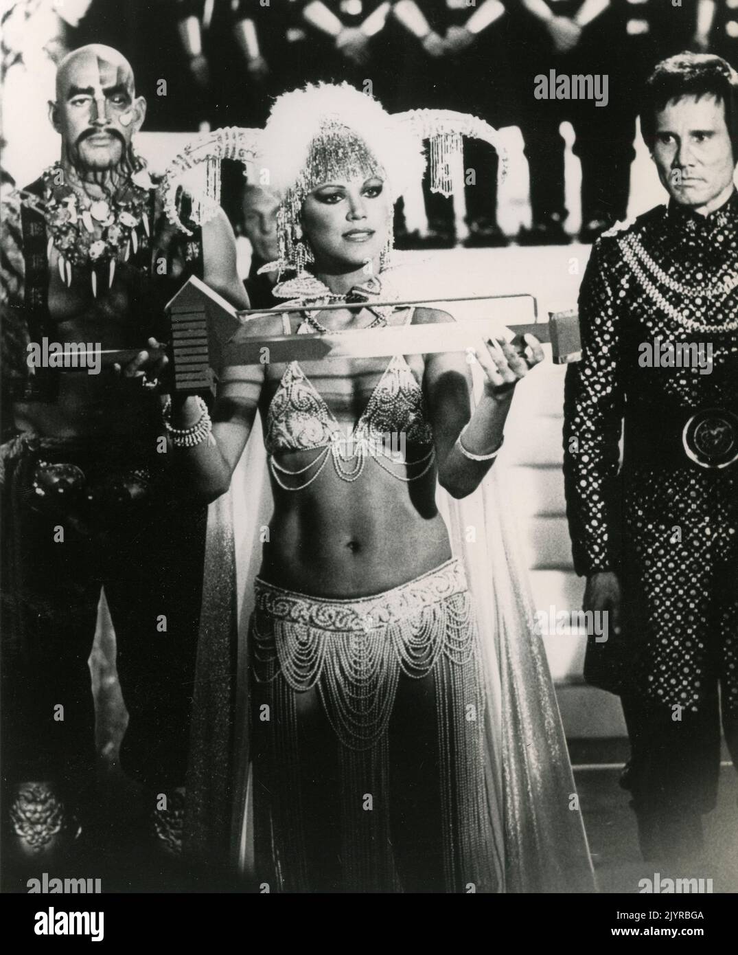 Actress Pamela Hensley and actors Henry Silva and Duke Butler in the movie Buck Rogers in the 25th Century, USA 1979 Stock Photo