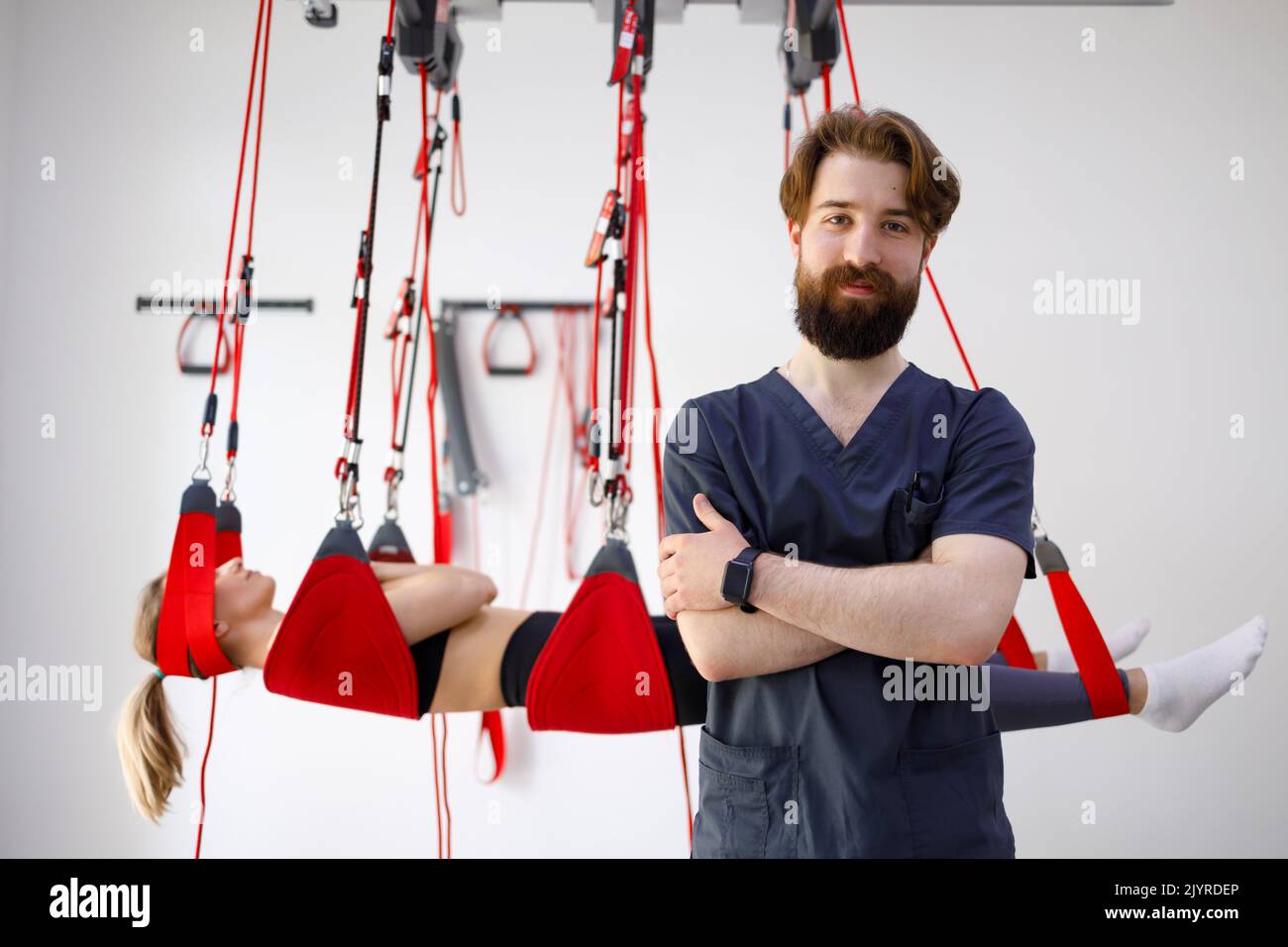 Portrait of a male physiotherapist doctor against the background of a ...