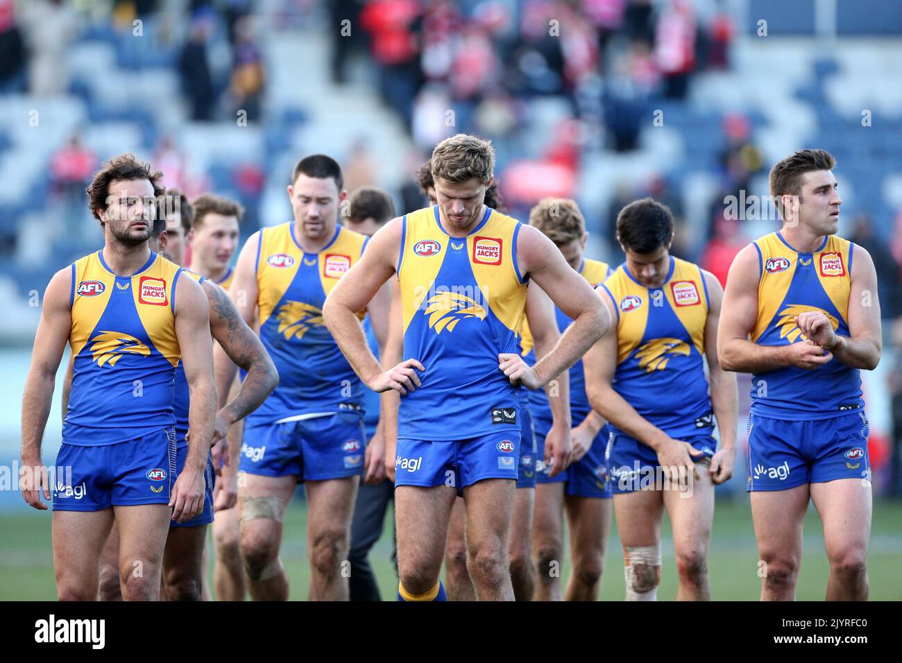 Nathan Vardy of the Eagles centre with team mates after their