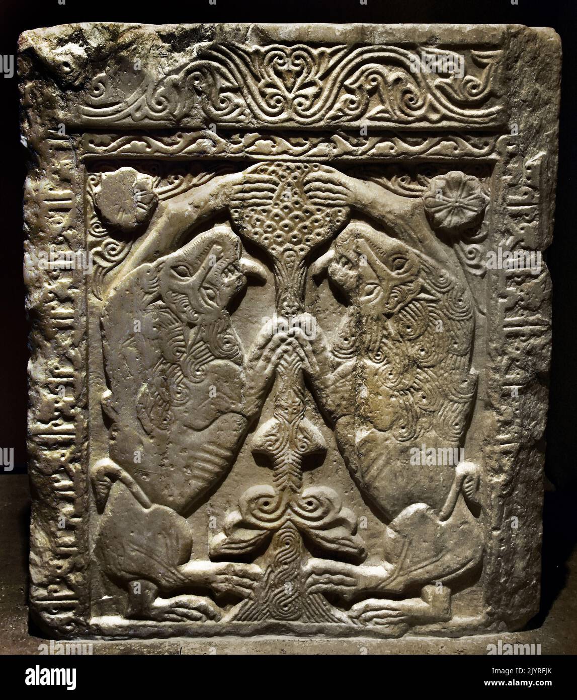 Bilateral marble closing slab, decorated with relief Tree of Life between 2  lions ( Pseudo Kufic ) and floral patterns on the frame, from Athens, 11th ,12th, Century, Byzantine and Christian Museum in Athens, Stock Photo