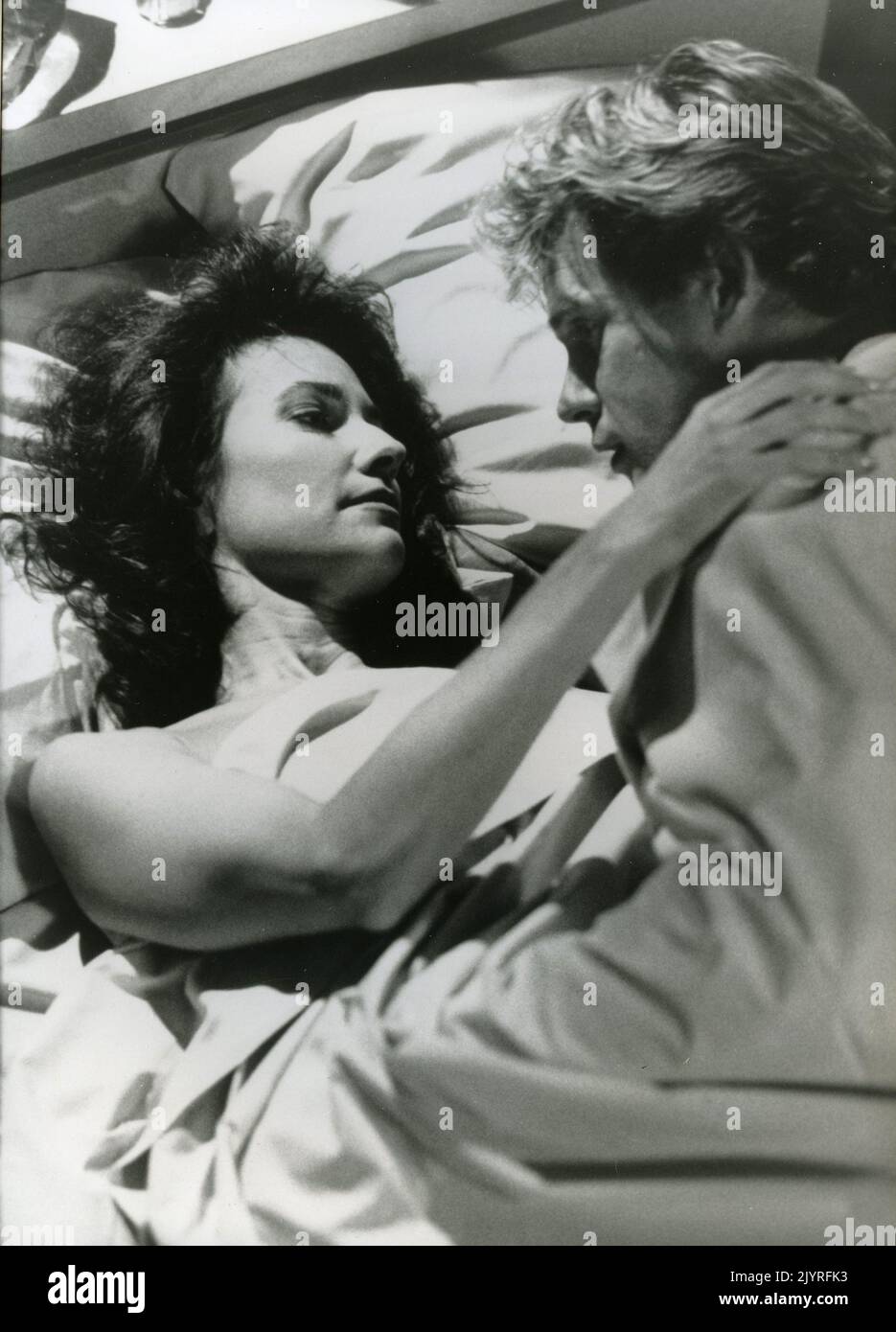 Actress Susan Lucci and actor Michael Dudikoff in the movie The Woman Who Sinned, USA 1991 Stock Photo