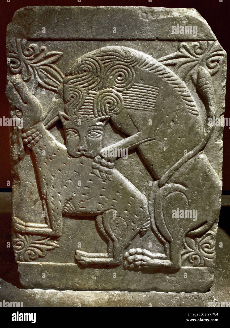 Byzantine and Marble closing slab, with relief representation, of a, deer being torn apart by a lion ,10th ,11th, Century, Byzantine and Christian Museum in Athens, Christian Museum in Athens, Stock Photo