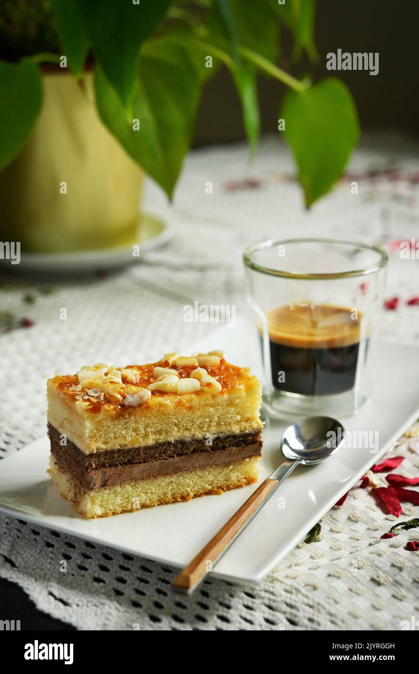 Crunchy Krantz Cake Walnut Cake and Espresso Coffee Cup Stock Photo