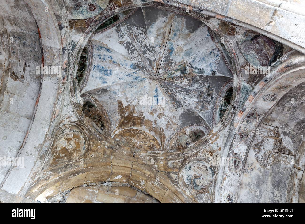 Bagrati Cathedral (Kutaisi Cathedral) dome, XI-century example of Georgian architecture with fragments of colorful frescos, interior view, Kutaisi. Stock Photo