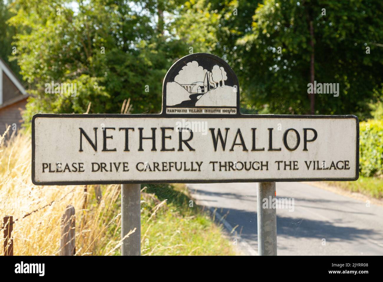 An old metal village sign for the Hampshire village of Nether Wallop Stock Photo