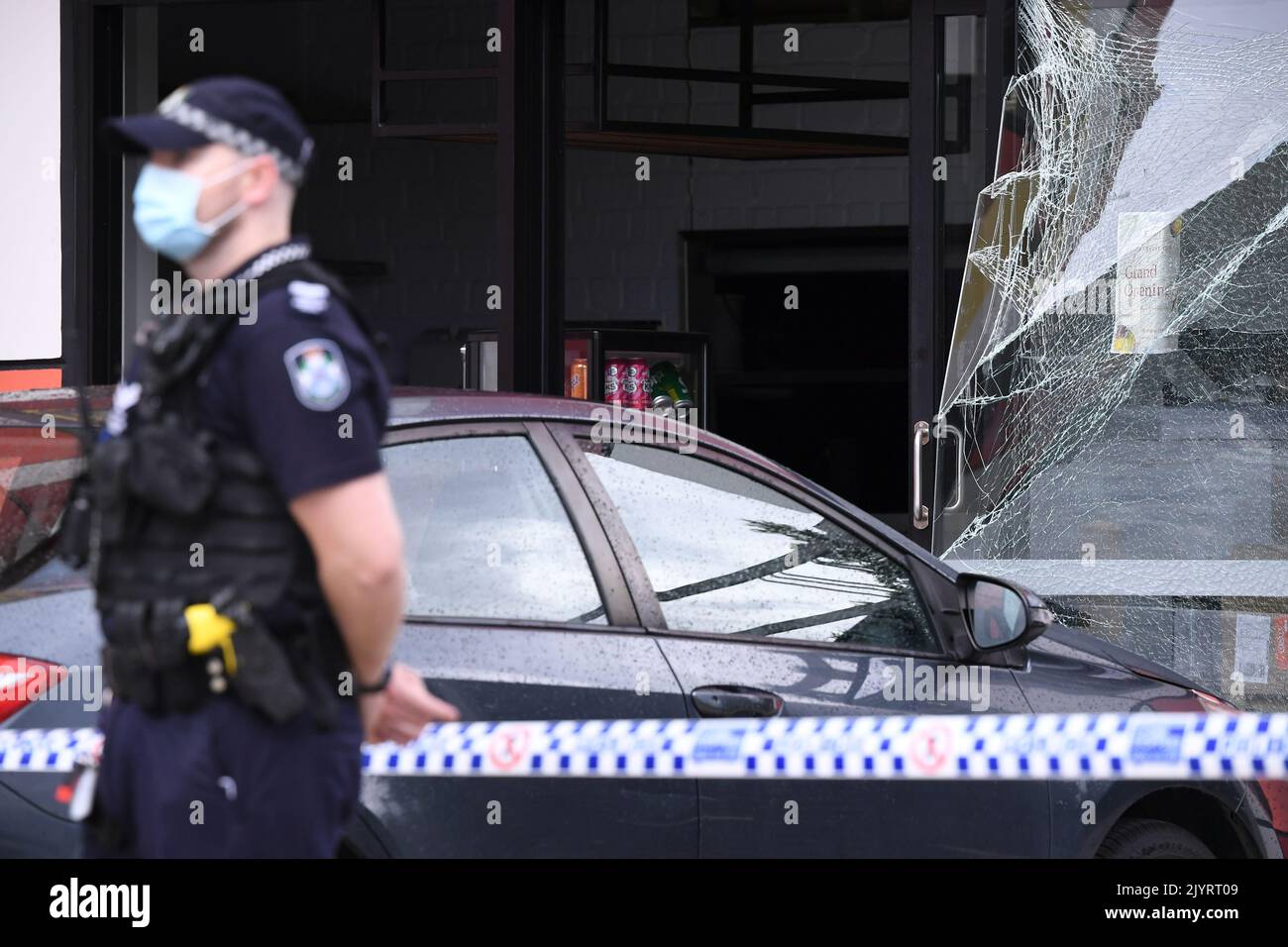 Emergency services are seen at the scene of a gas explosion at a Robina