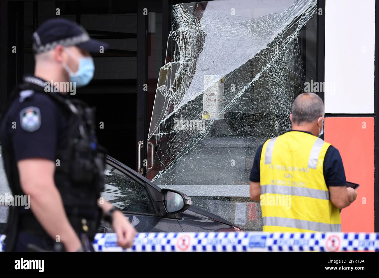 Emergency services are seen at the scene of a gas explosion at a Robina
