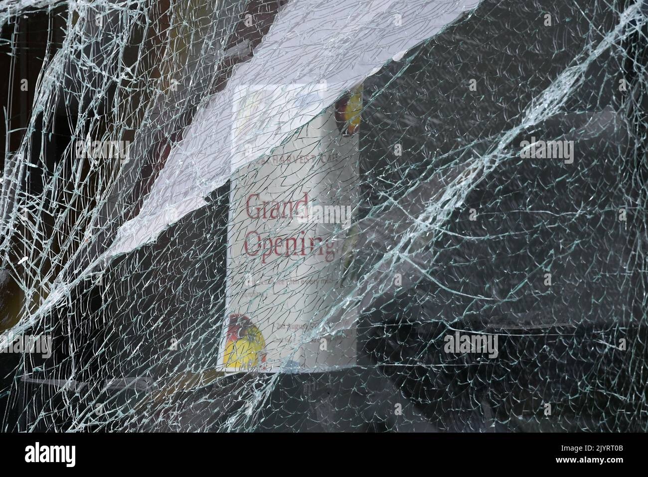 A shattered window at the scene of a gas explosion at a Robina cafe on