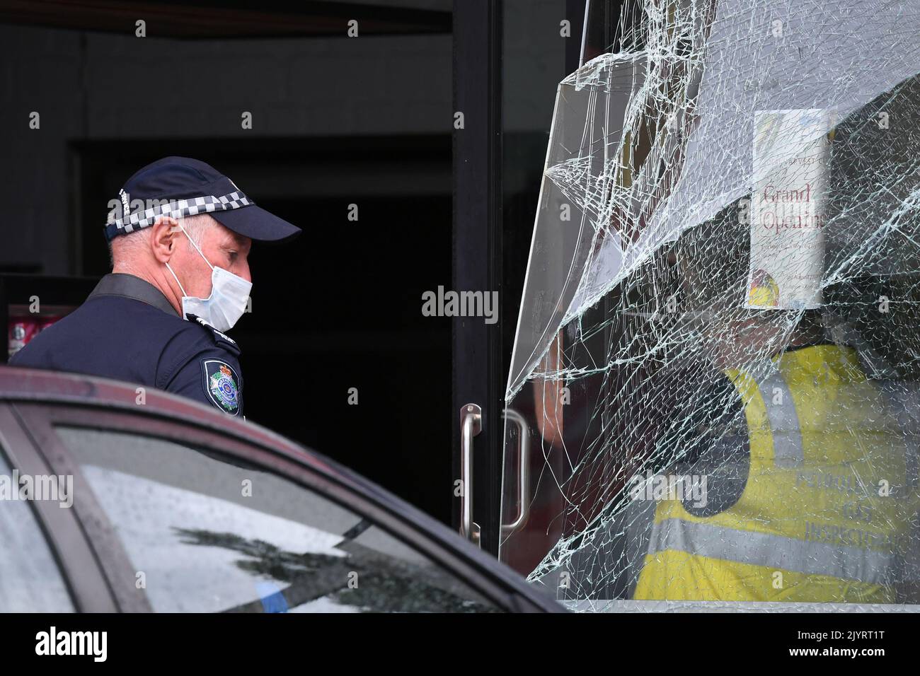 Emergency services are seen at the scene of a gas explosion at a Robina