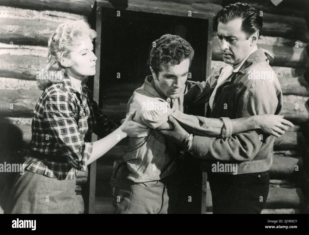 Actress Rhonda Fleming, and actors Steve Rowland and Stewart Granger in the movie Gun Glory, USA 1957 Stock Photo