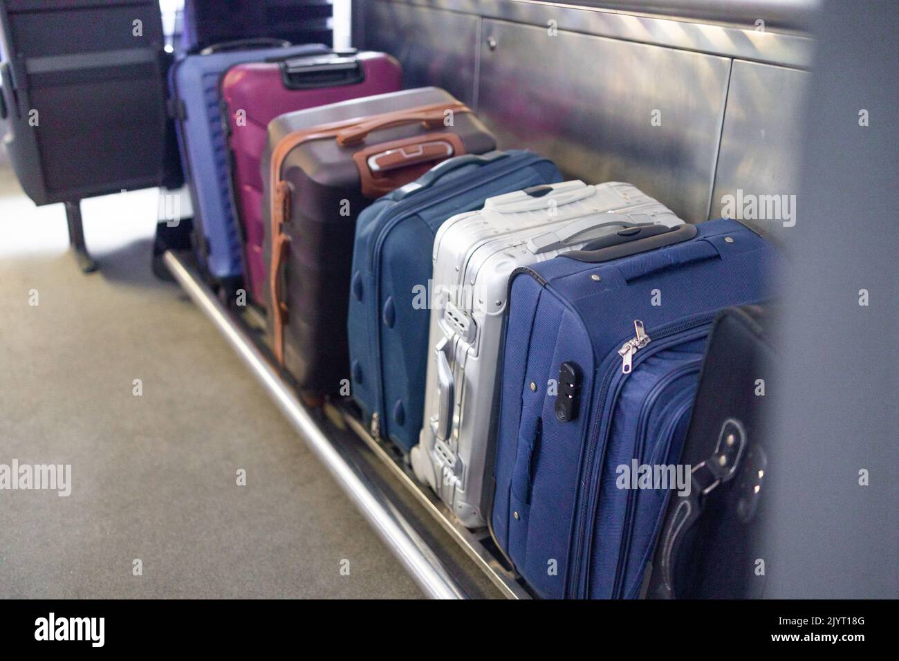 Luggage on shelf railway train. Holiday vacation, tourism, travel