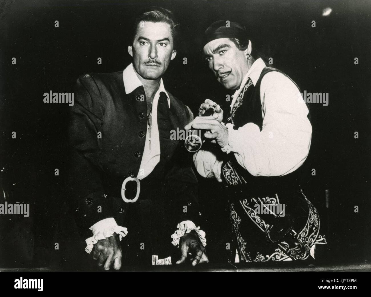 errol flynn, milton krims, on the set of the movie crossed swords, 1953  Stock Photo - Alamy