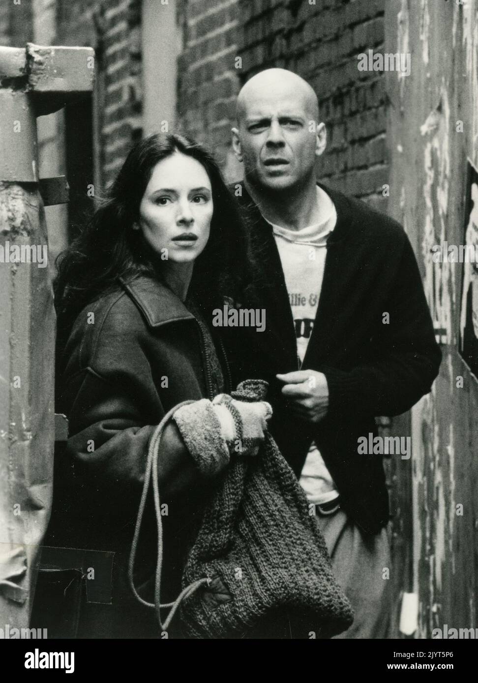 American actress Madeleine Stowe and actor Bruce Willis in the movie 12 Monkeys, USA 1995 Stock Photo