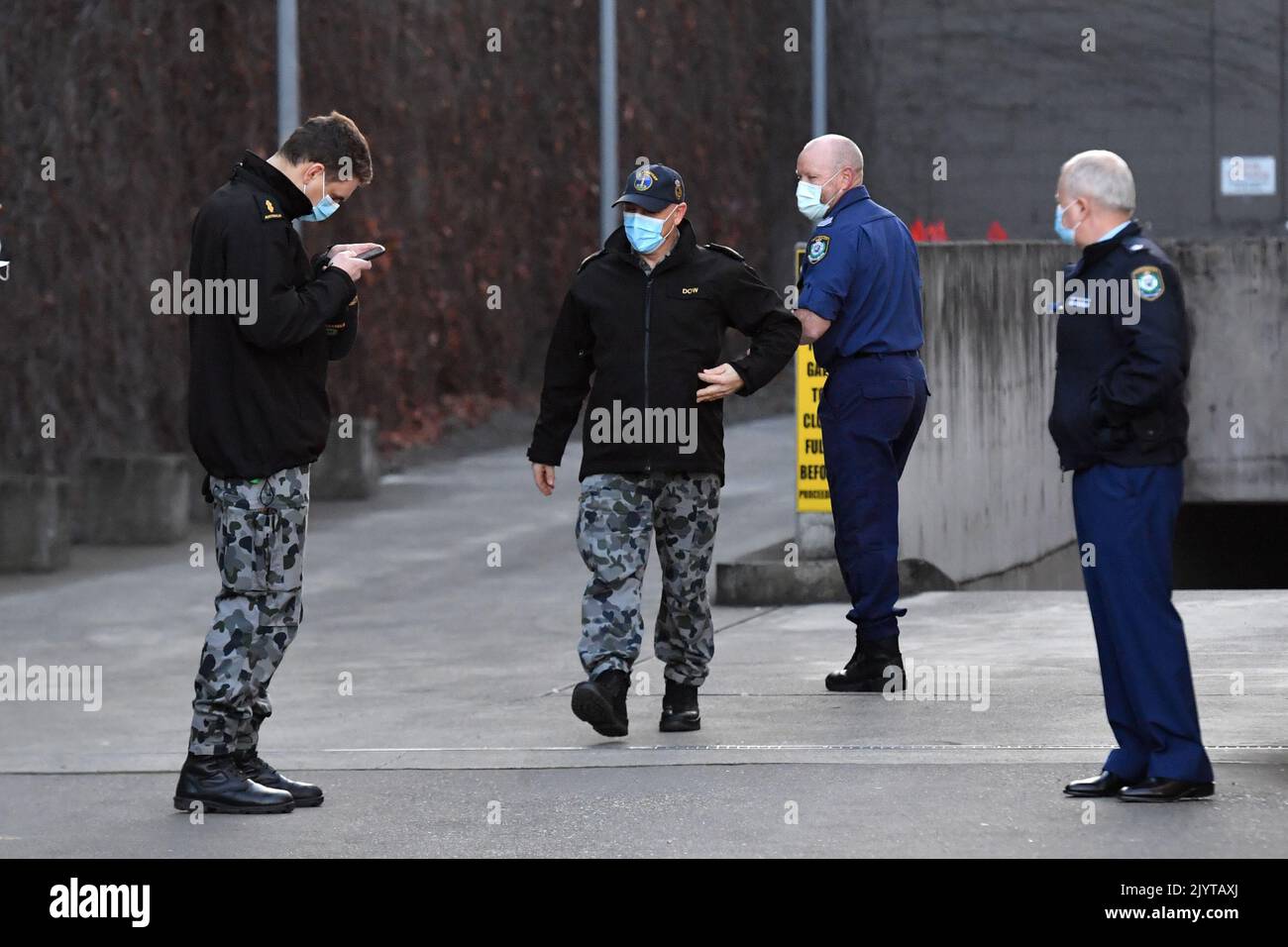 Australian Defence Force personnel and NSW police are seen at Fairfield ...