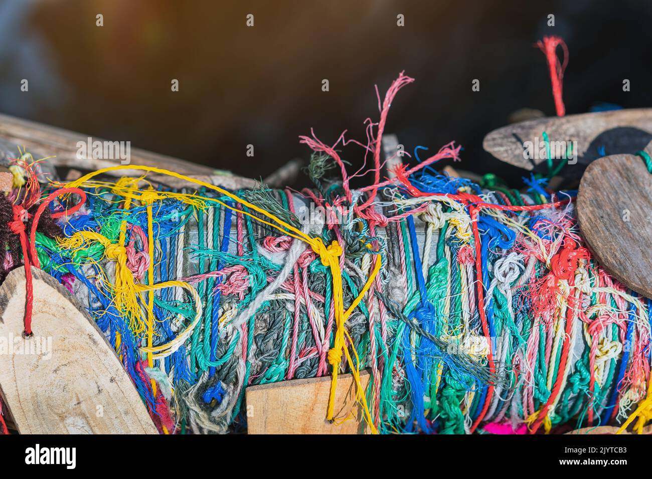 Messy Rails Many suspended chaotically intertwined colorful ropes tied into messy ...
