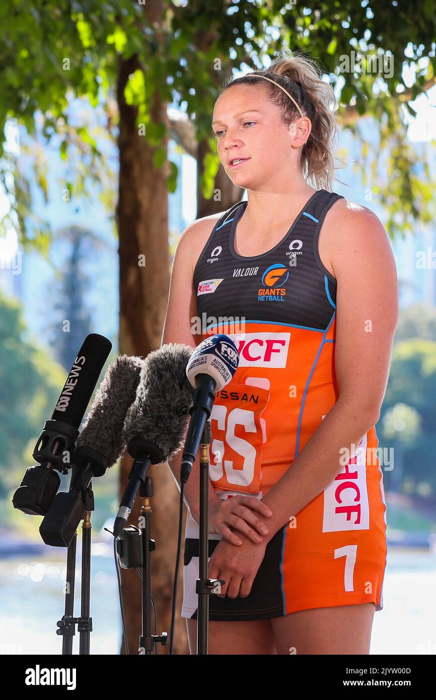 Jo harten of the giants netball team fronts the media during the super