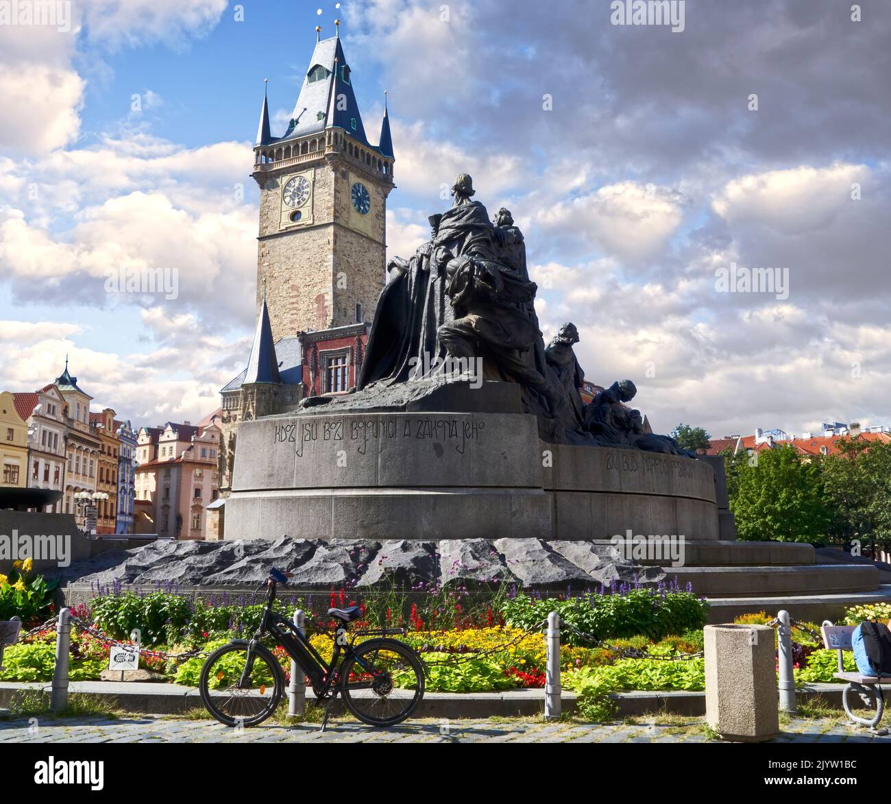 Prague, Czechia, August 29, 2022: Staromestske namesti, the oldest square in Prague with the sculpture of a martyr, with parked bicycle, bicycle tour Stock Photo