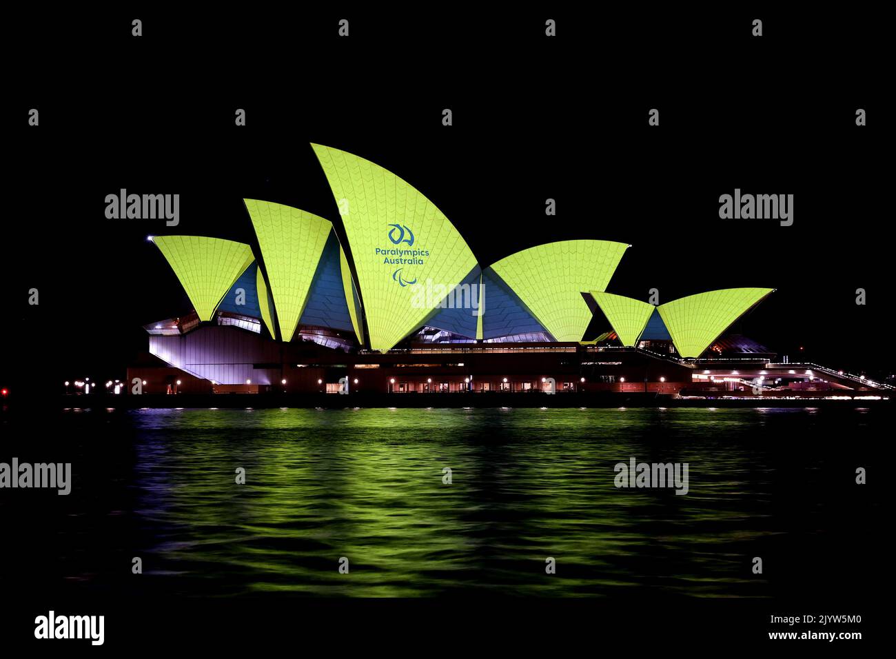 Images of Australian Olympians and Paralympians are projected onto the ...
