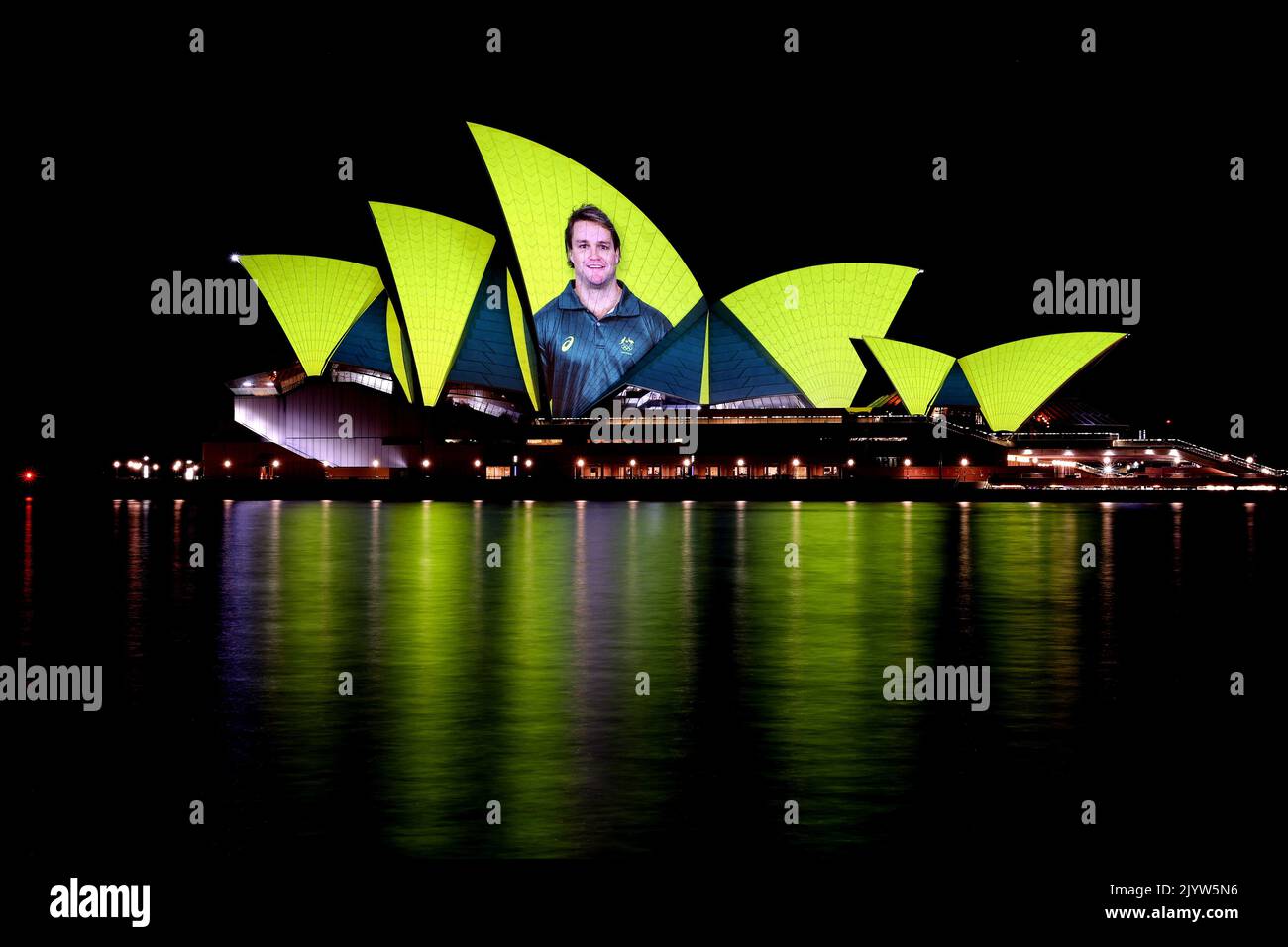 Images of Australian Olympians and Paralympians are projected onto the ...